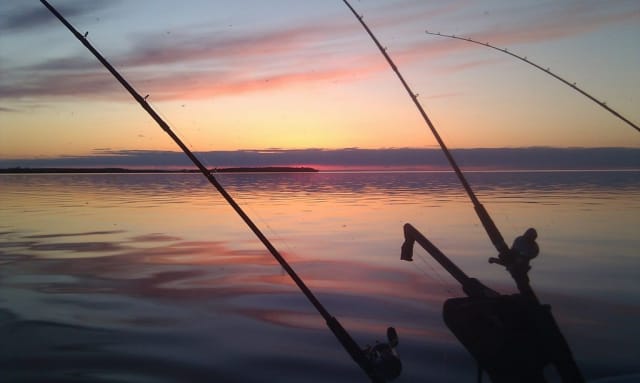 guided fishing trip in Door County at sunset